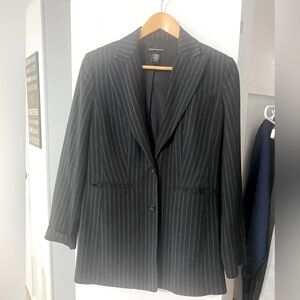 Women’s business suit. Fitted Blazer and wide leg pants.